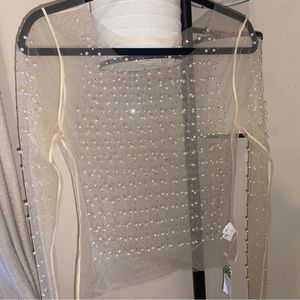 See through shirt with “pearl looking”